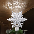 Christmas Tree Topper, 9.6” Snowflake Tree Toppers Lighted Indoor with Rotating 3D Silver Snowflake LED Projector Hollow Glitter Lighted for Tree Christmas Decorations Holiday Ornaments